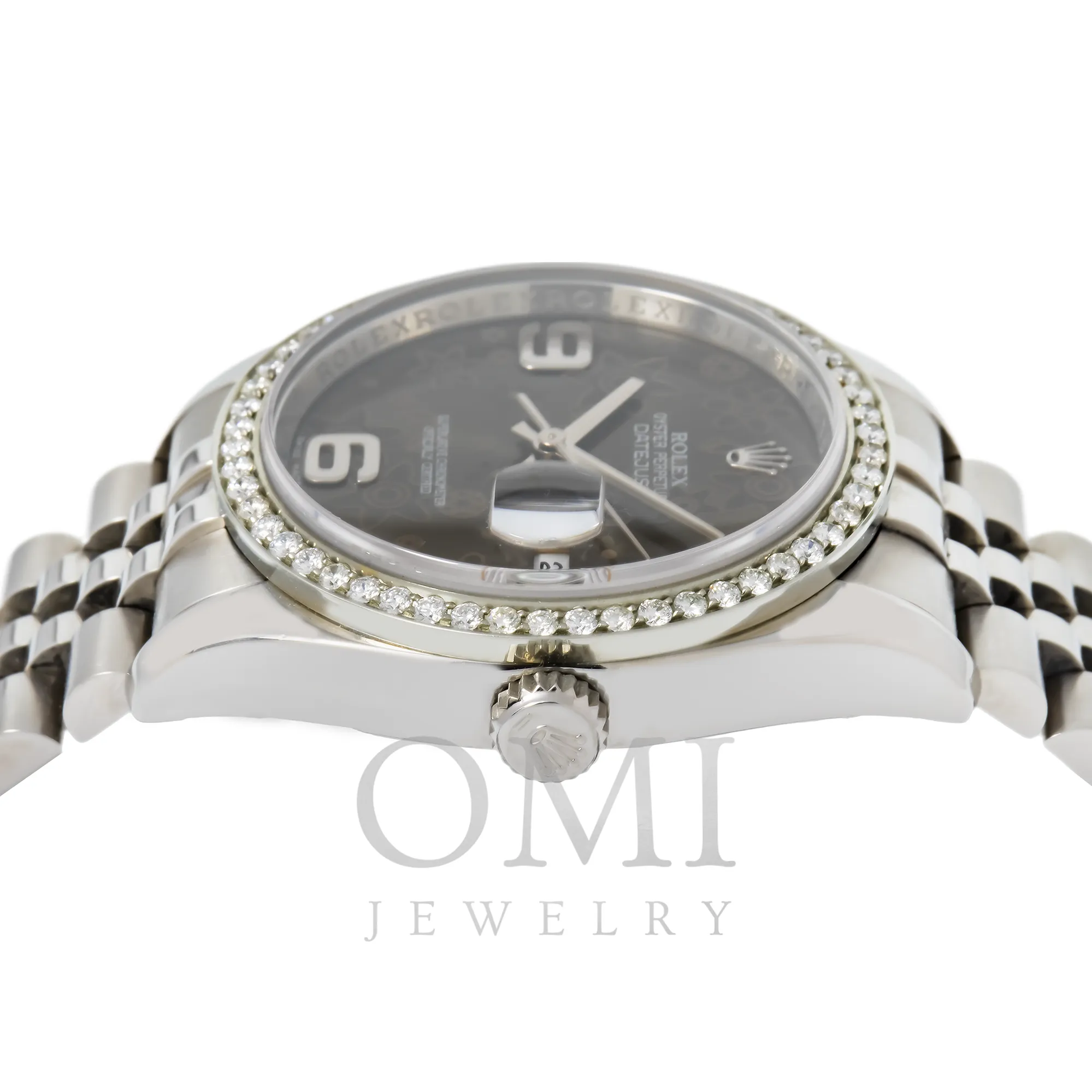 ROLEX DATEJUST 116234 36MM JUBILLE BRACELET WITH BLACK FLORAL DIAL AND DIAMOND BEZEL.