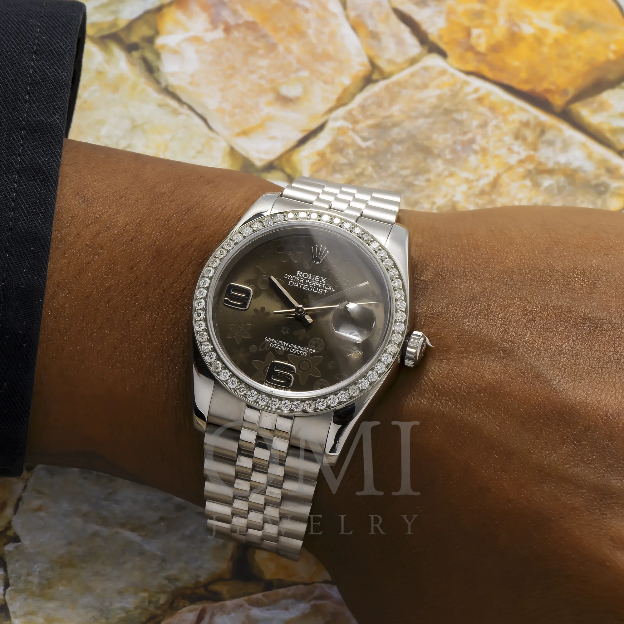 ROLEX DATEJUST 116234 36MM JUBILLE BRACELET WITH BLACK FLORAL DIAL AND DIAMOND BEZEL.