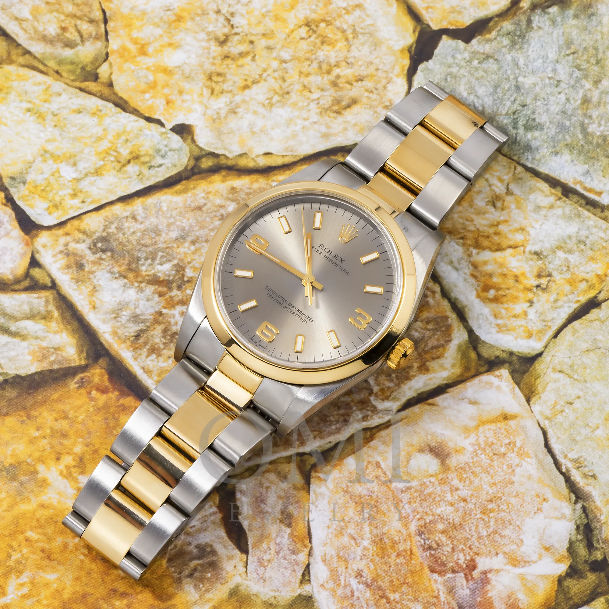 ROLEX OYSTER PERPETUAL DATE 14203 34MM CHAMPAGNE SEMI NUMERALS DIAL AND TWO-TONE OYSTER BRACELET